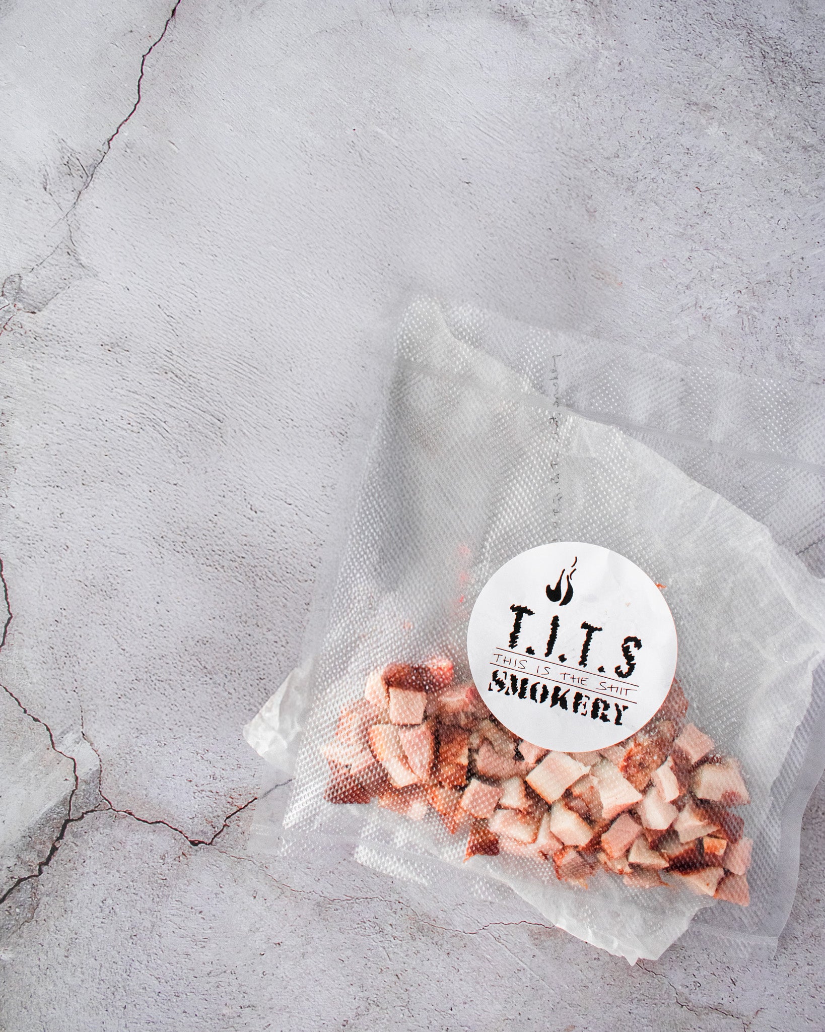Vacuum Packed diced smoked bacon by This.Is.The.Shit aka. 'T.I.T.S Smokery'. Smokey goodness delicious and dish enchancing.