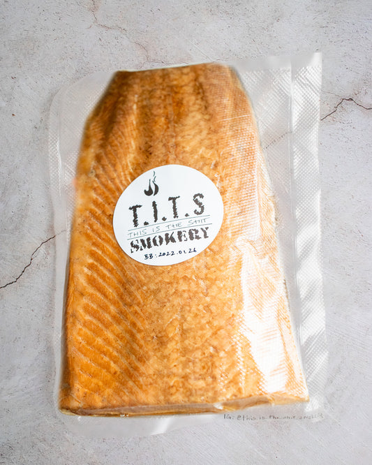 Vacuum Packed Whole smoked side of Salmon by This.Is.The.Shit aka. 'T.I.T.S Smokery'. Smokey goodness delicious and dish enchanting, enhancing!